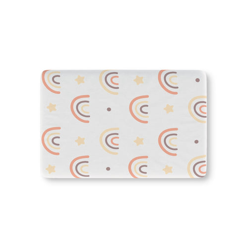 Peach Rainbow fitted crib sheet on a nursery crib mattress