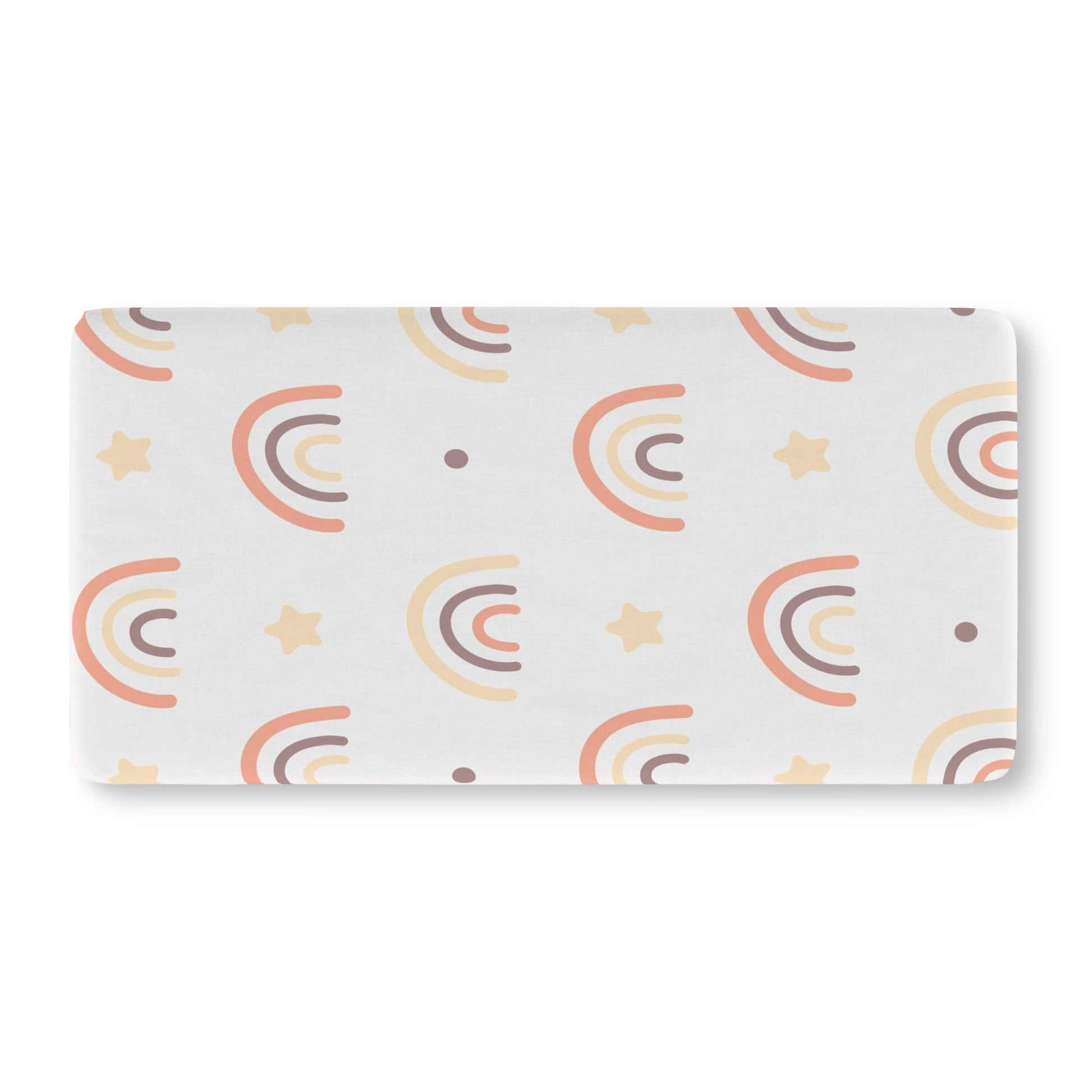 Fitted crib sheet with hand-drawn peach and cream rainbows