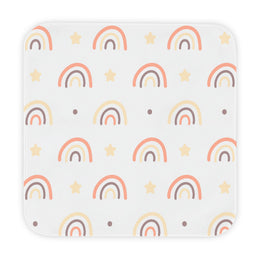 Peach Rainbow hooded baby towel wrapped around a baby