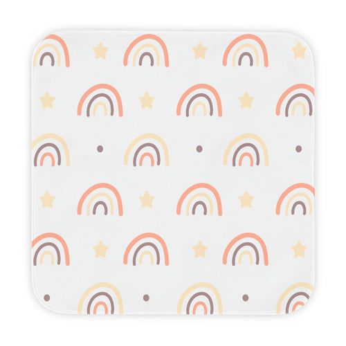 Peach Rainbow hooded baby towel wrapped around a baby