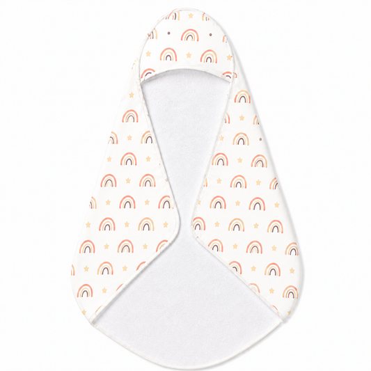 Peach Rainbow hooded baby towel wrapped around a baby