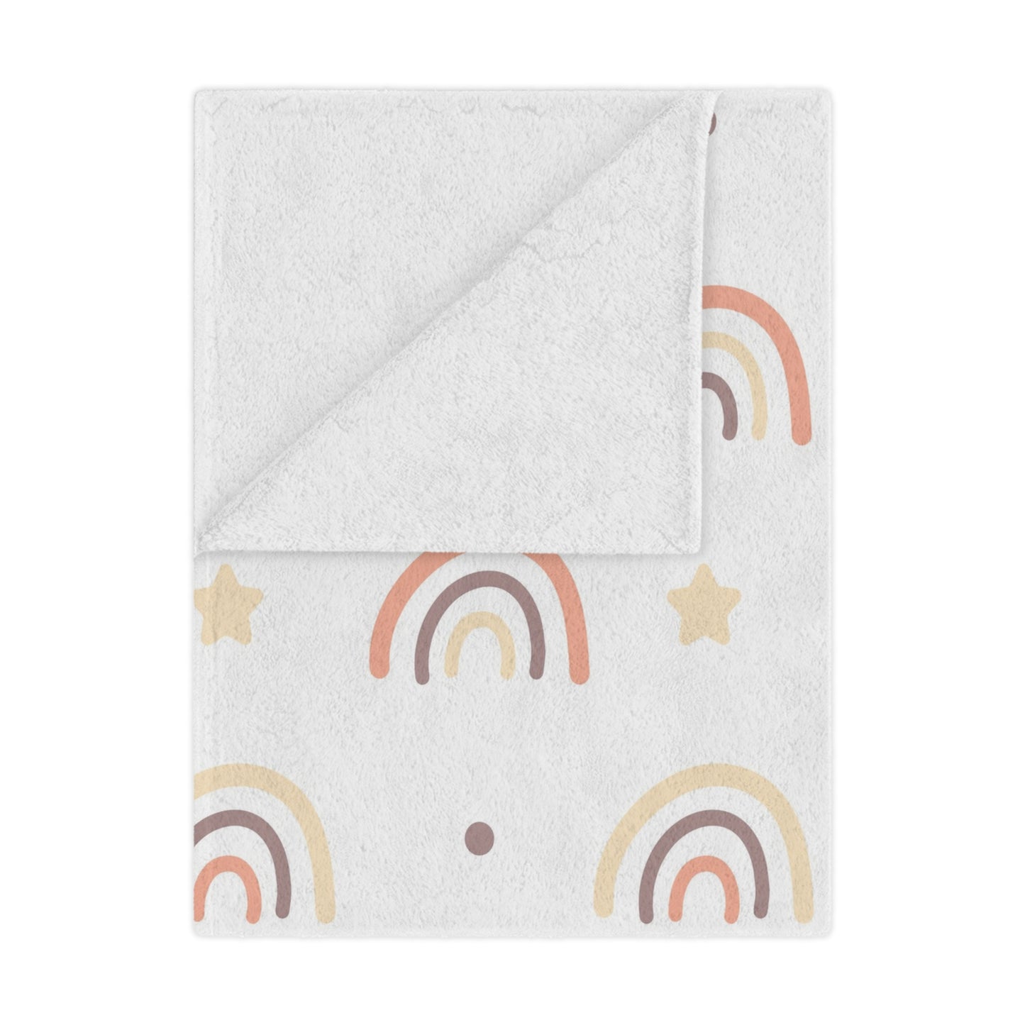 Peach Rainbow minky baby blanket draped over a crib
