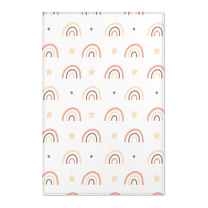 Peach Rainbow nursery area rug in a baby room
