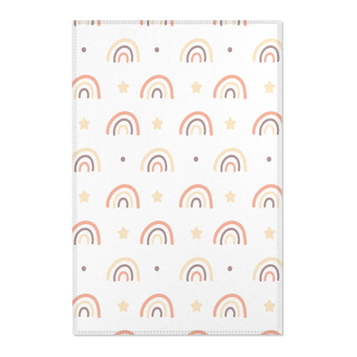 Peach Rainbow nursery area rug in a baby room