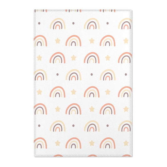 Peach Rainbow nursery area rug in a baby room