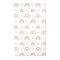 Rainbow nursery area rug in soft peach, cream and taupe