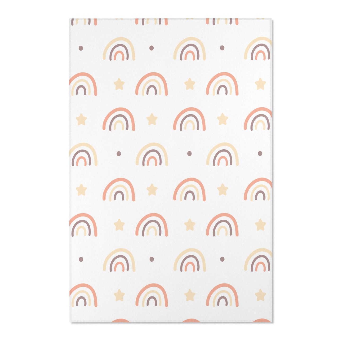 Close detail of the drawn rainbows on the nursery area rug