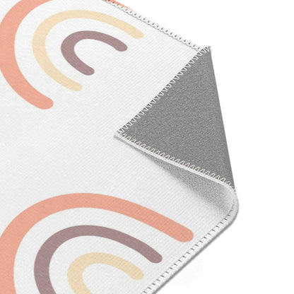 Peach Rainbow rug print detail in peach and cream