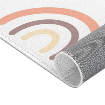 Peach Rainbow nursery area rug for a baby room floor