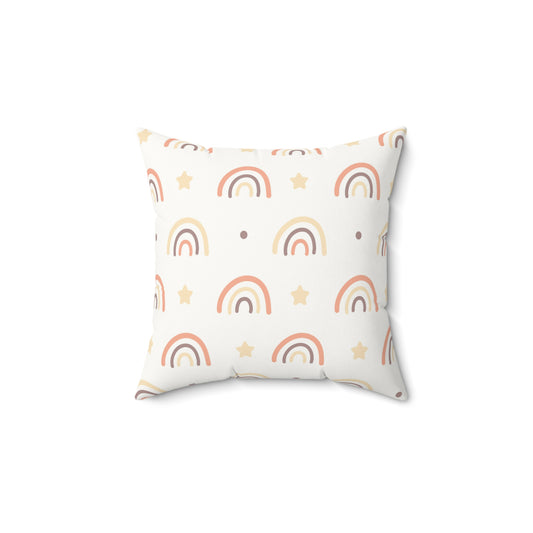 Peach Rainbow decorative nursery pillow on a glider chair