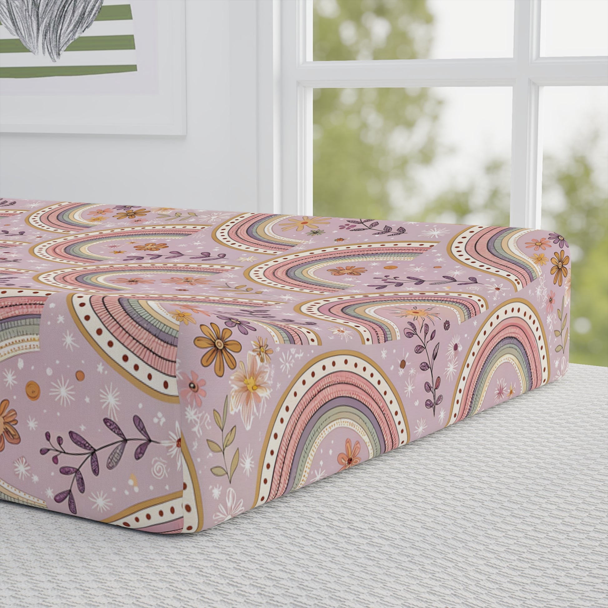 Close detail of the Petal Arches print on the changing pad cover