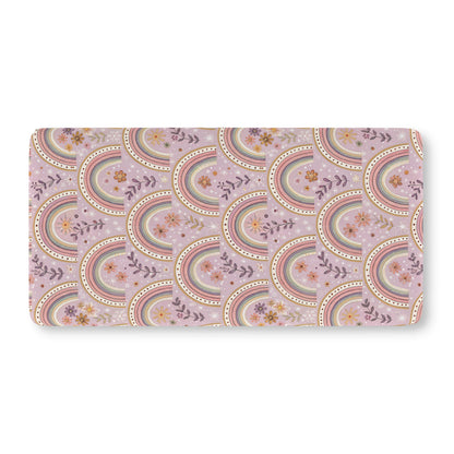 Fitted crib sheet with blush and sage arches on soft mauve