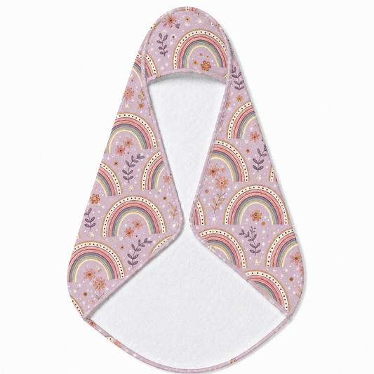 Petal Arches hooded baby towel wrapped around a baby
