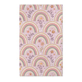 Blush arch nursery area rug on a soft mauve ground