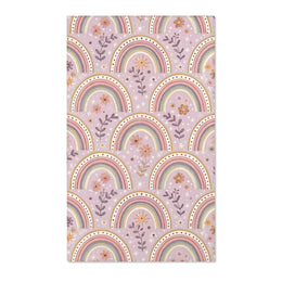 Blush arch nursery area rug on a soft mauve ground