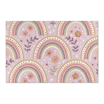 Low pile nursery rug with close-set blush and sage arches