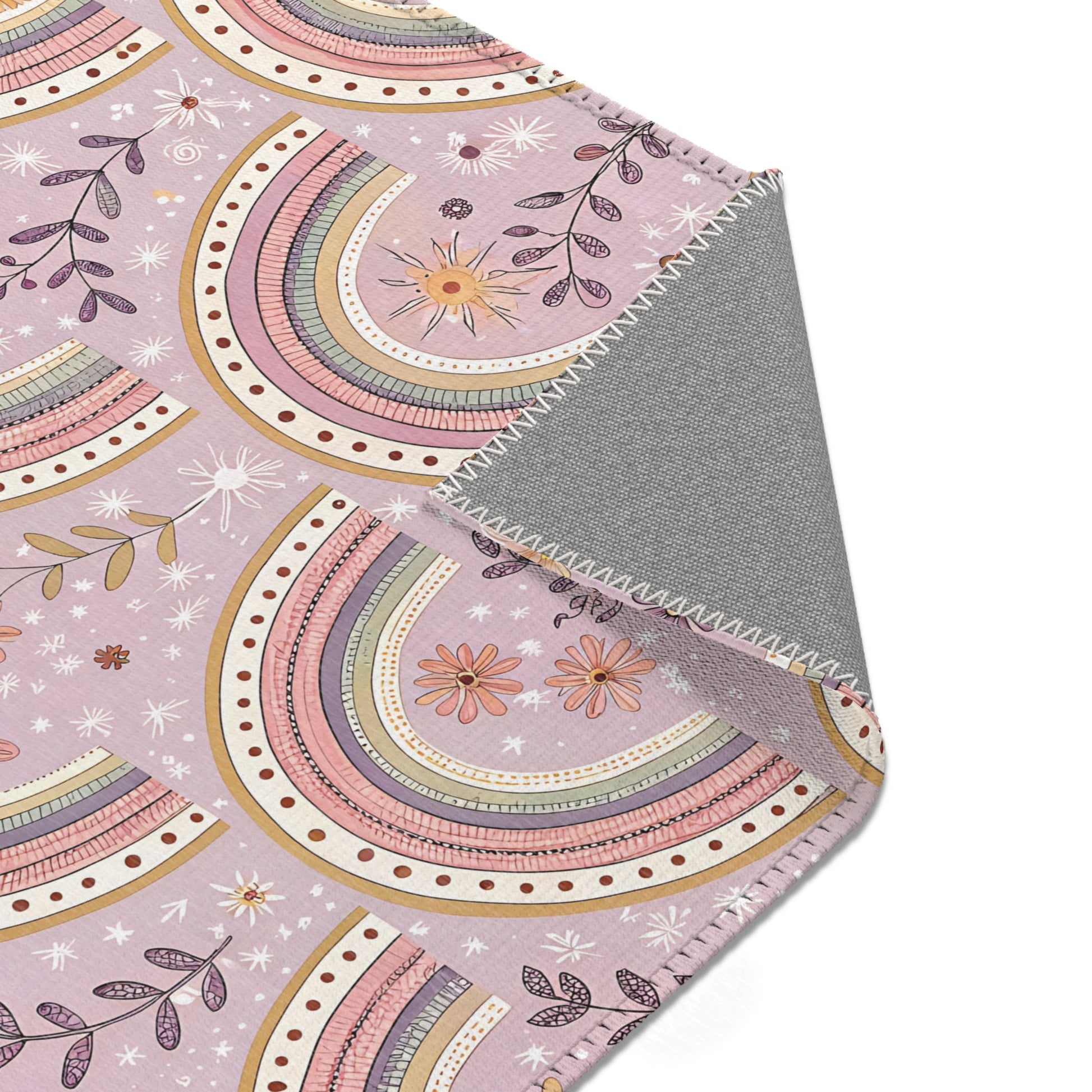Nursery area rug printed edge to edge with scalloped arches