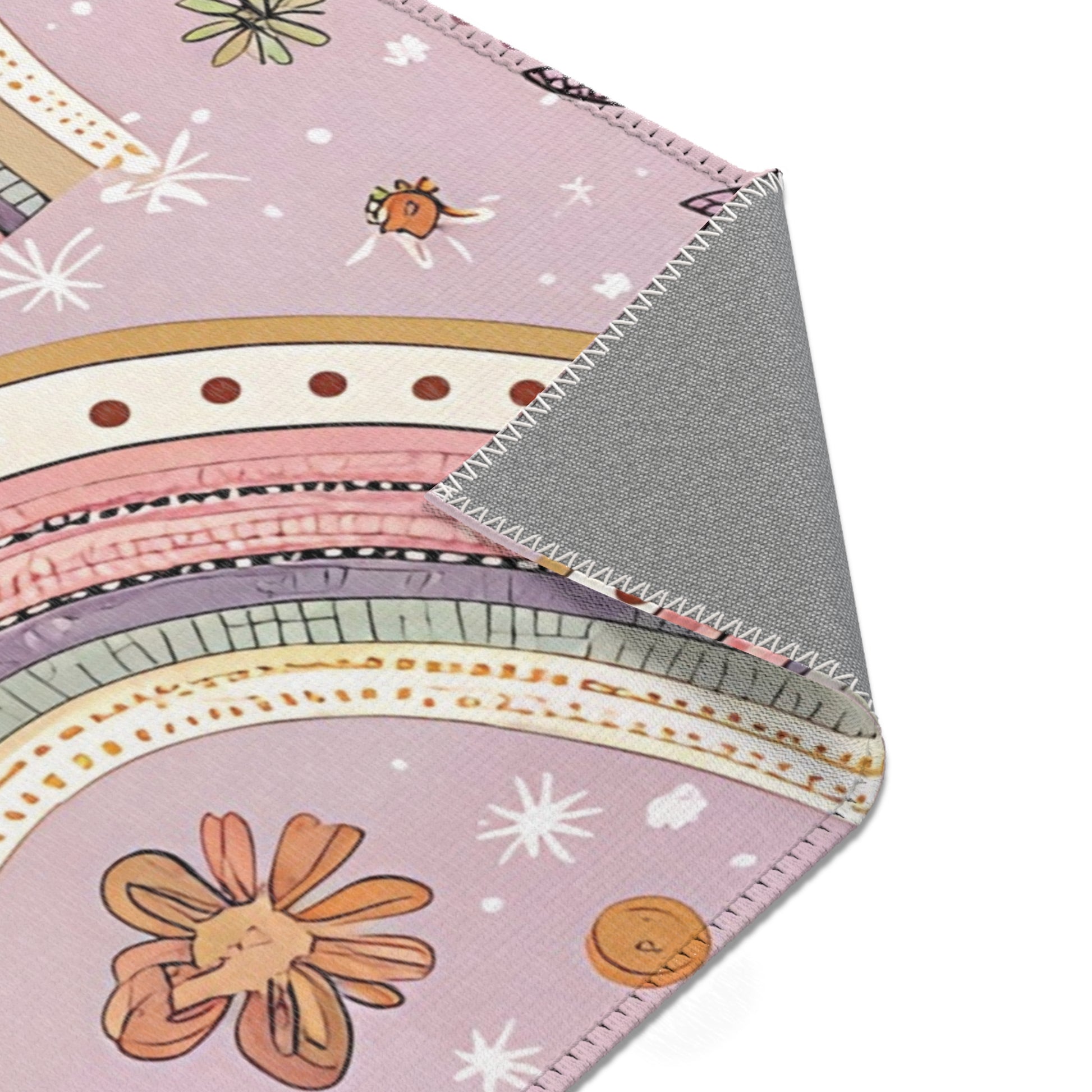Petal Arches rug print detail in blush and gold