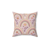 Petal Arches decorative nursery pillow on a glider chair