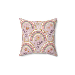 Petal Arches decorative nursery pillow on a glider chair