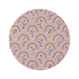 Petal Arches round nursery rug on a baby room floor