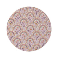 Petal Arches round nursery rug on a baby room floor