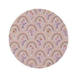 Petal Arches round nursery rug on a baby room floor