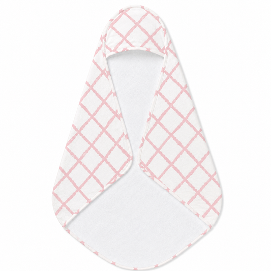 Pink Trellis hooded baby towel wrapped around a baby