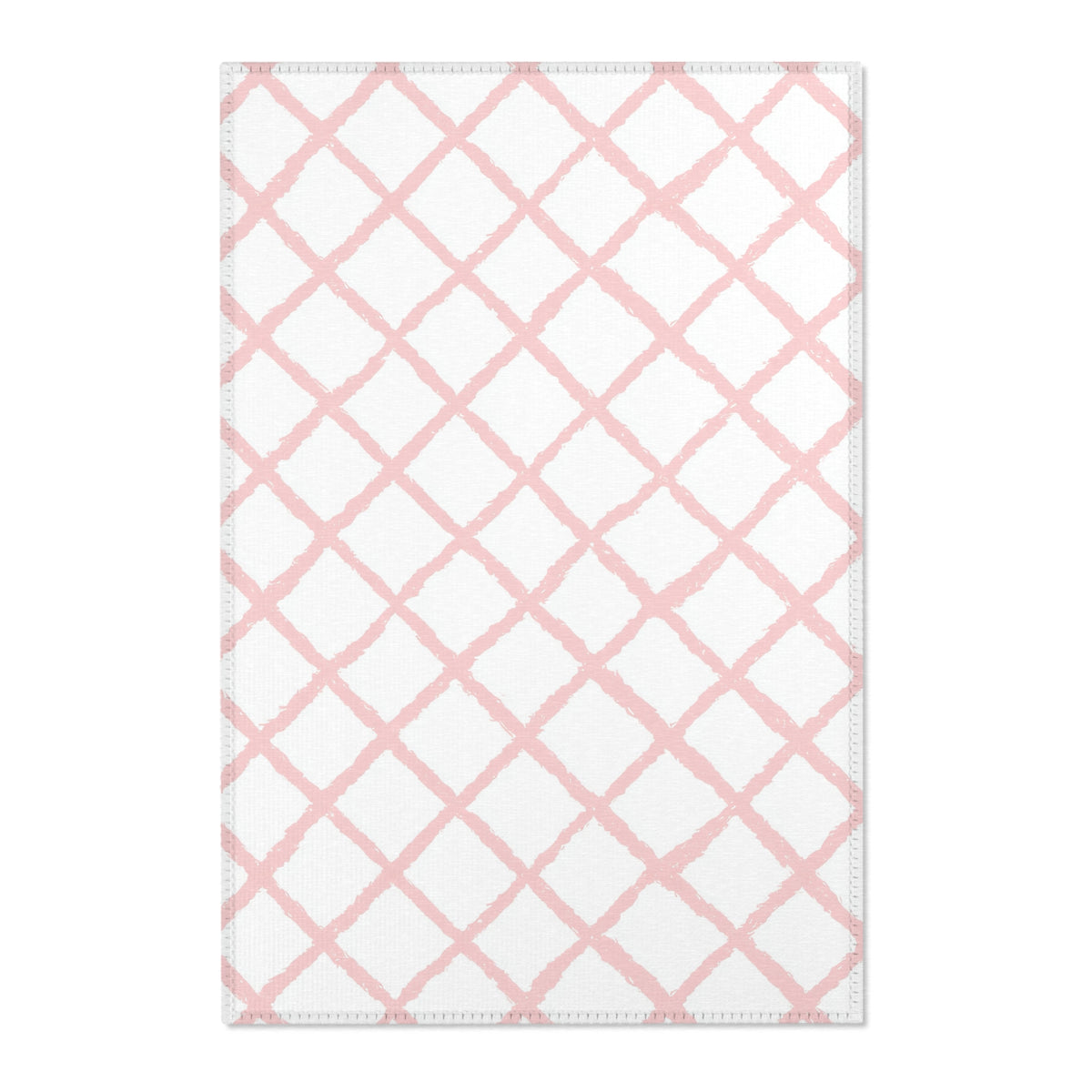 Pink trellis nursery area rug in a baby girl's bedroom