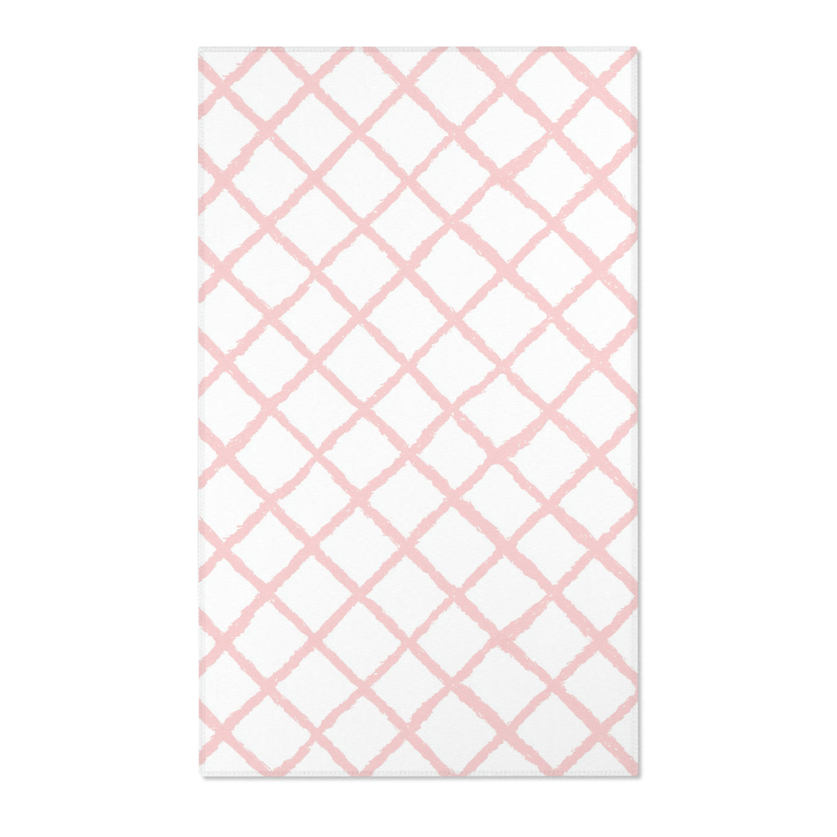 Rectangular pink lattice print nursery rug shown from above