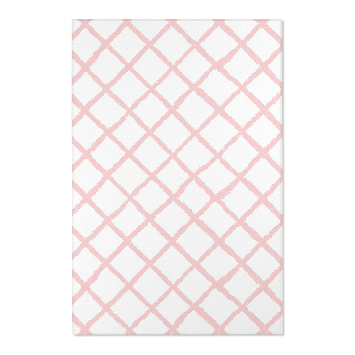Close-up of the hand-painted pink trellis print on a nursery rug
