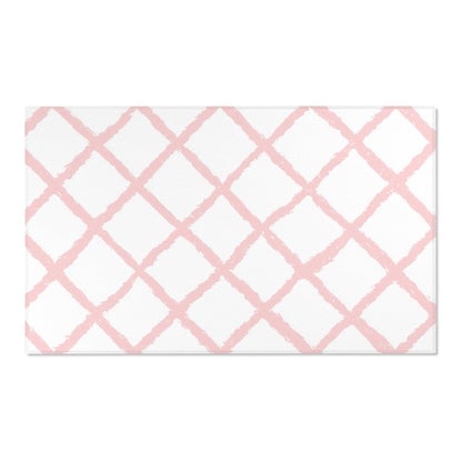 Pink Trellis nursery area rug in a baby room