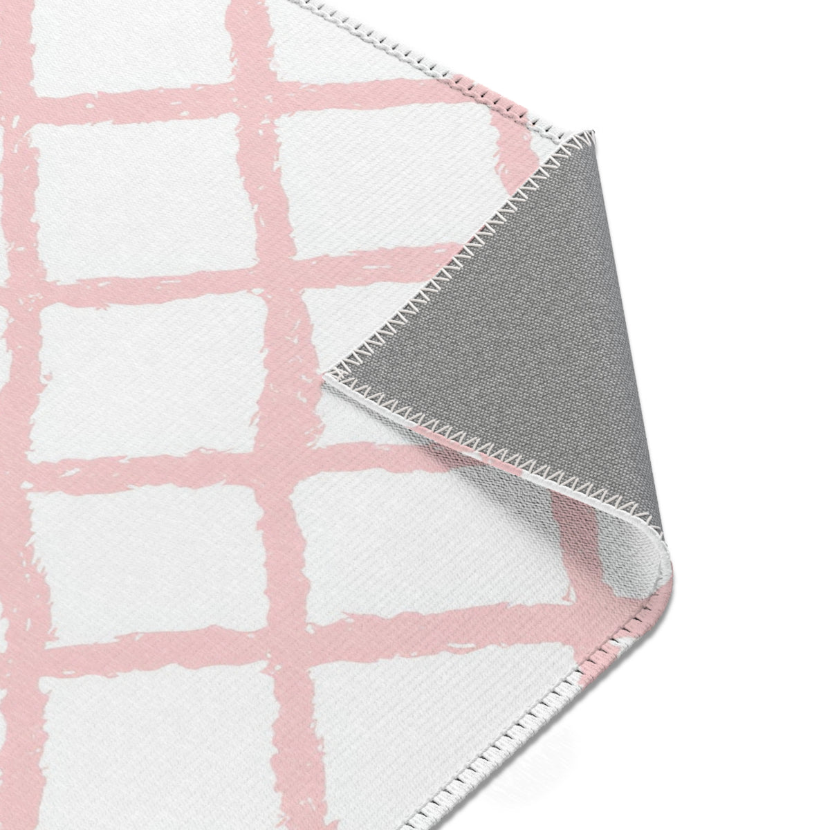 Pink trellis nursery area rug in landscape orientation