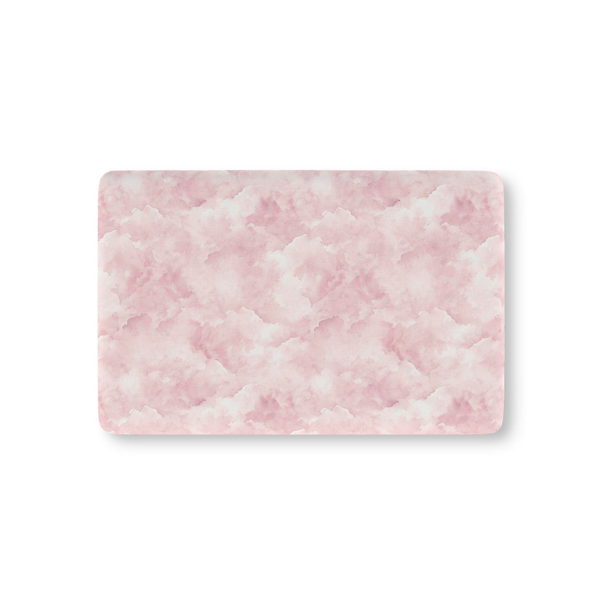 Pink watercolor clouds fitted crib sheet on a nursery crib mattress