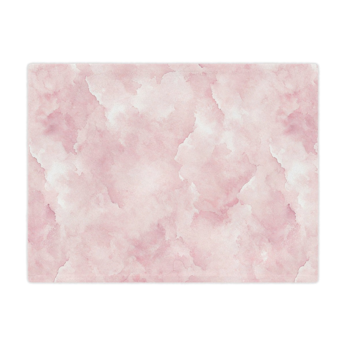 Close-up of the plush minky texture on a pink watercolor baby blanket