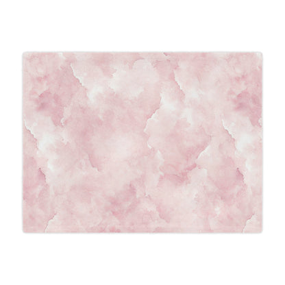 Close-up of the plush minky texture on a pink watercolor baby blanket
