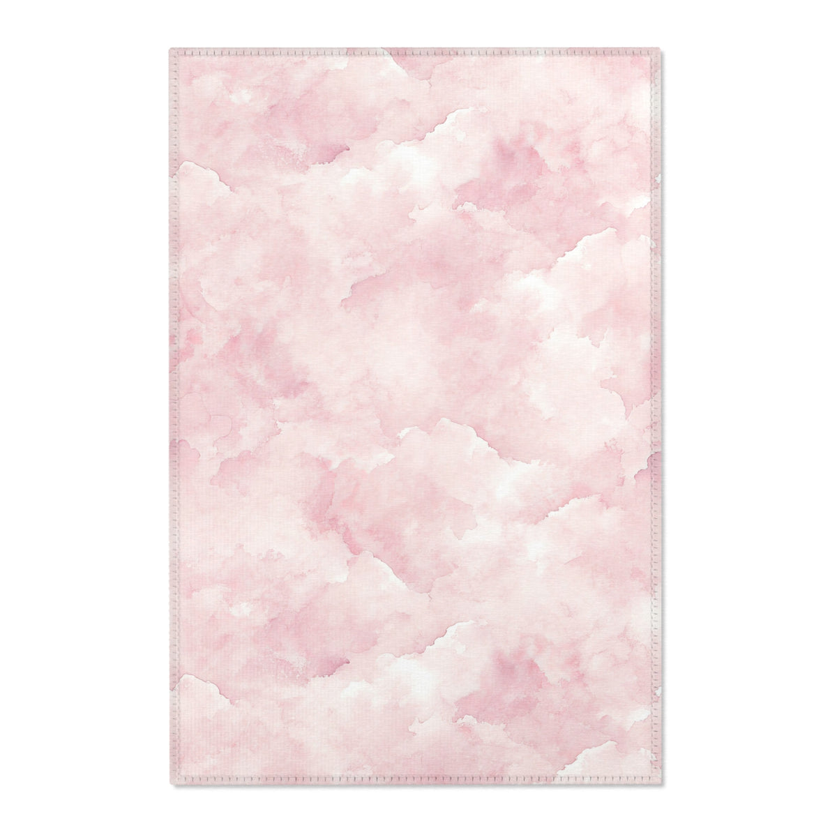 Pink watercolor clouds nursery area rug in a baby girl's bedroom