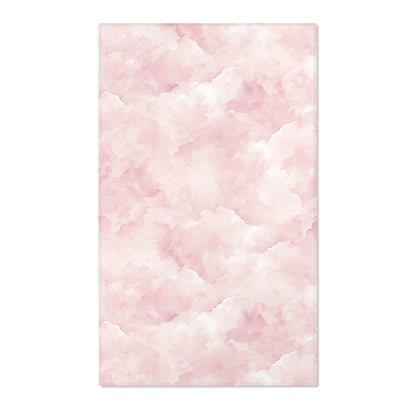 Rectangular pink cloud print nursery rug shown from above