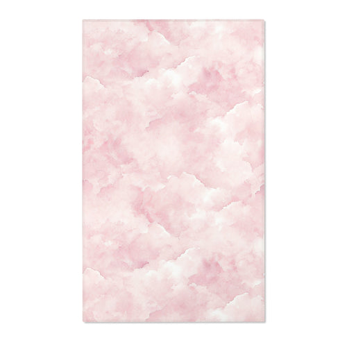 Rectangular pink cloud print nursery rug shown from above