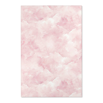 Close-up of the watercolor print on a pink nursery area rug
