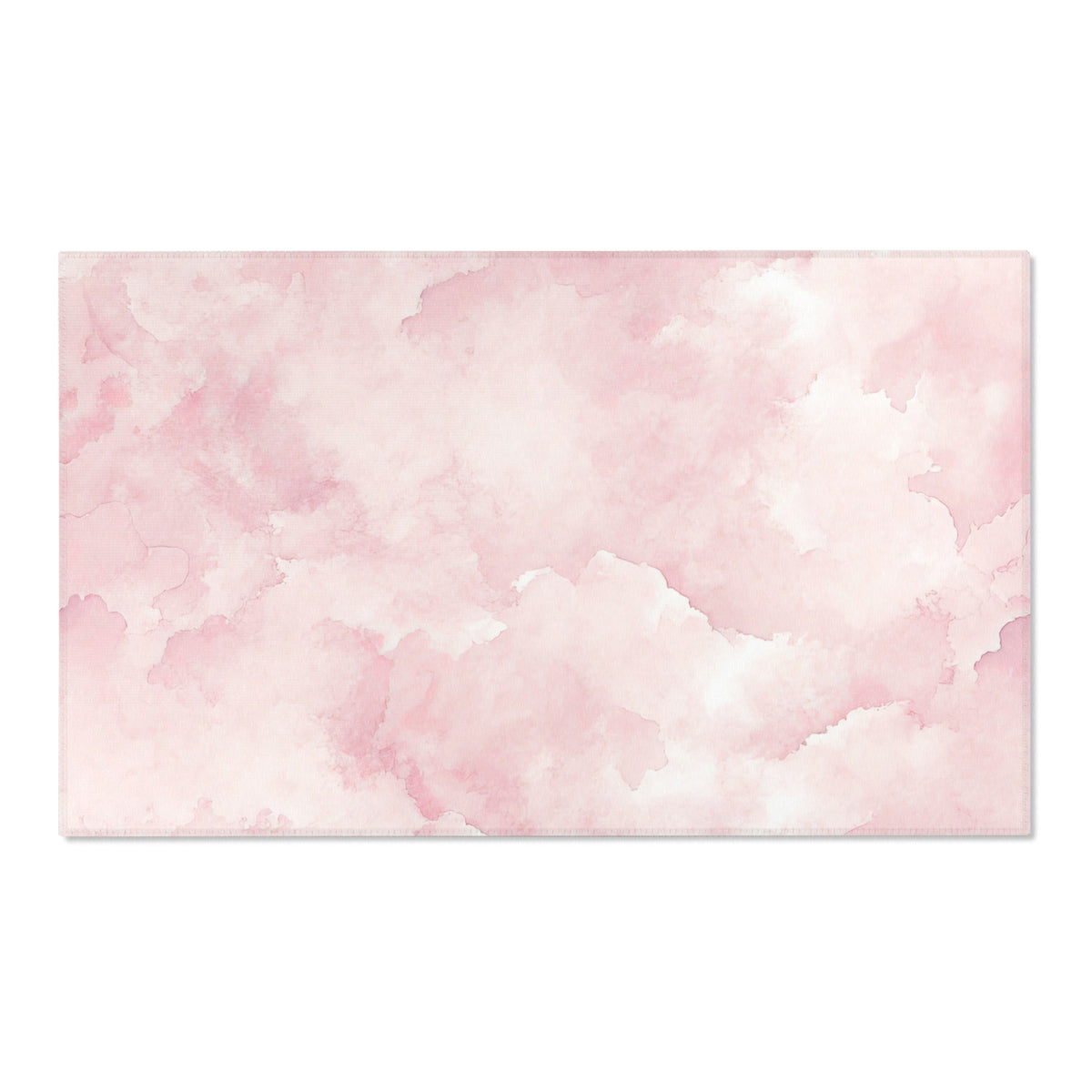Pink Watercolor Clouds nursery area rug in a baby room