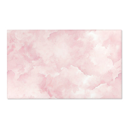 Pink Watercolor Clouds nursery area rug in a baby room