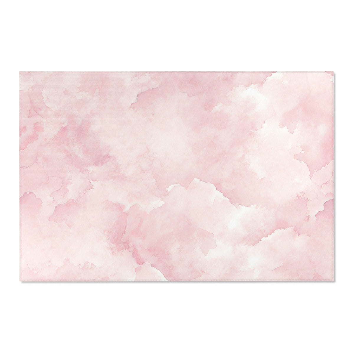 Corner detail of the pink watercolor clouds nursery rug