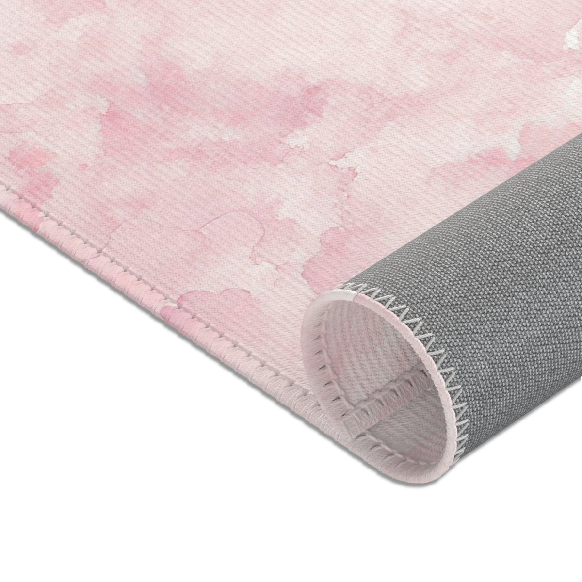 Soft pink nursery rug shown at full size