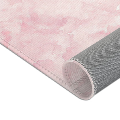 Soft pink nursery rug shown at full size