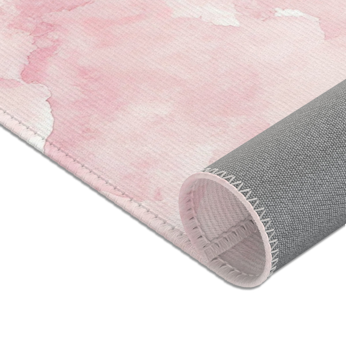 Pink watercolor clouds area rug in portrait orientation