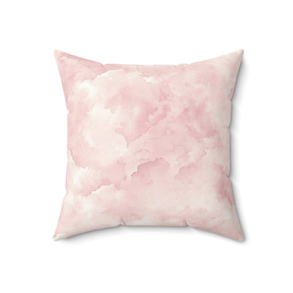 Close-up of the faux suede texture on a pink nursery cushion