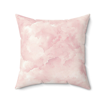 Pink watercolor clouds nursery pillow styled on a daybed