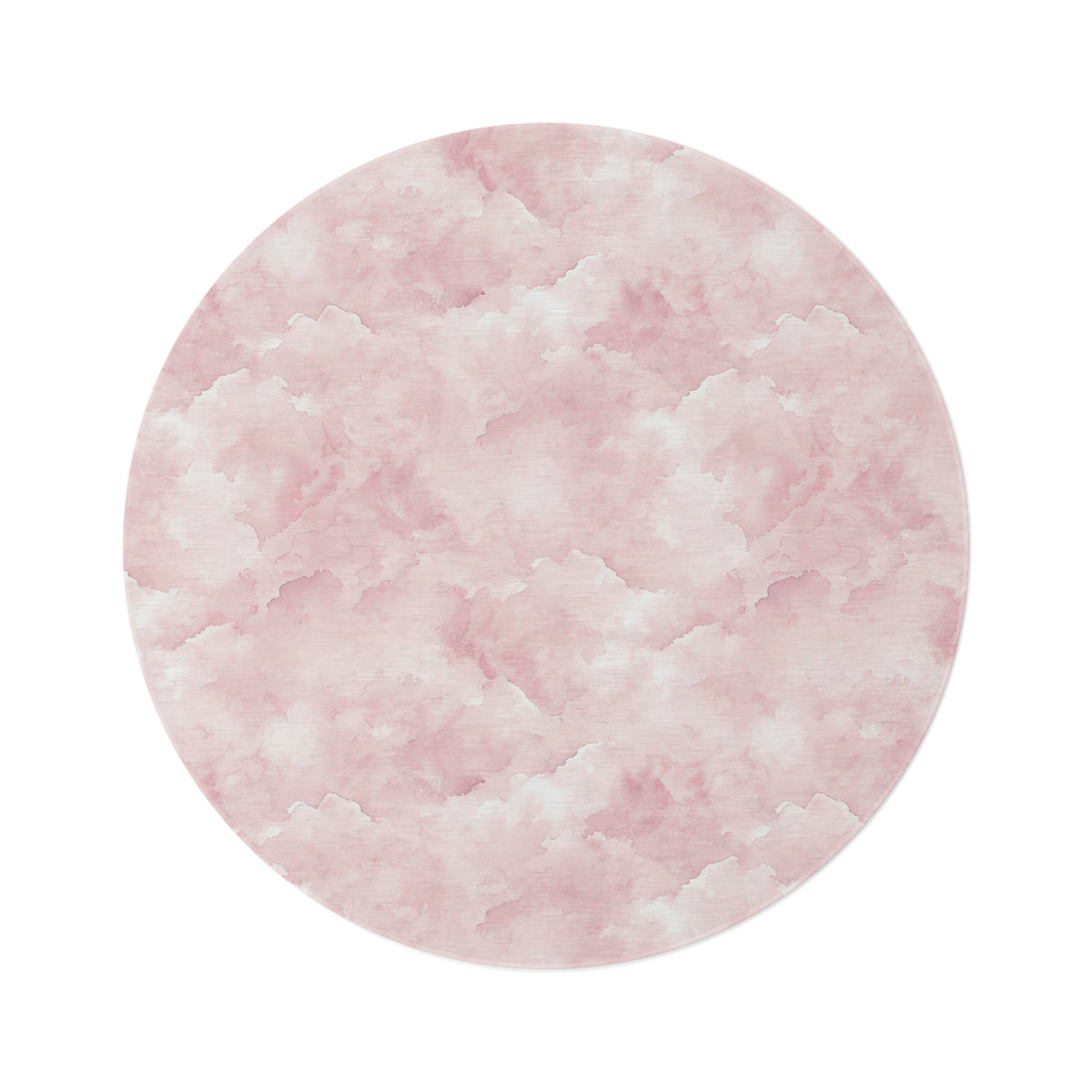 Pink watercolor clouds round nursery rug on a baby girl's bedroom floor
