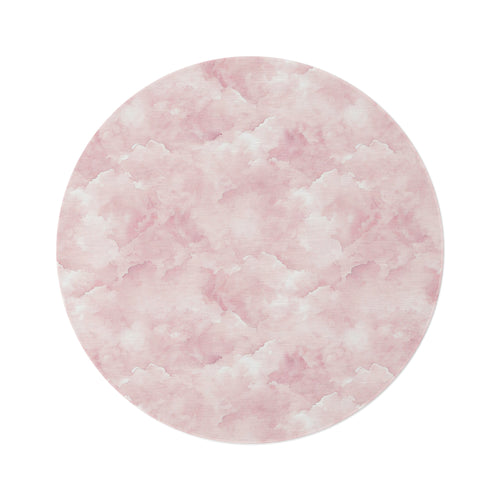 Pink watercolor clouds round nursery rug on a baby girl's bedroom floor